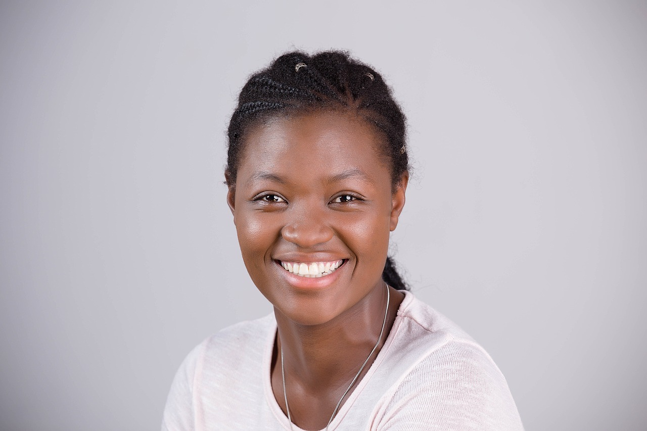 black woman, smiling, portrait